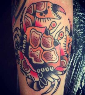 Colourful crab arm tattoo