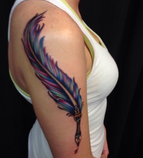 Colourful feather pen tattoo