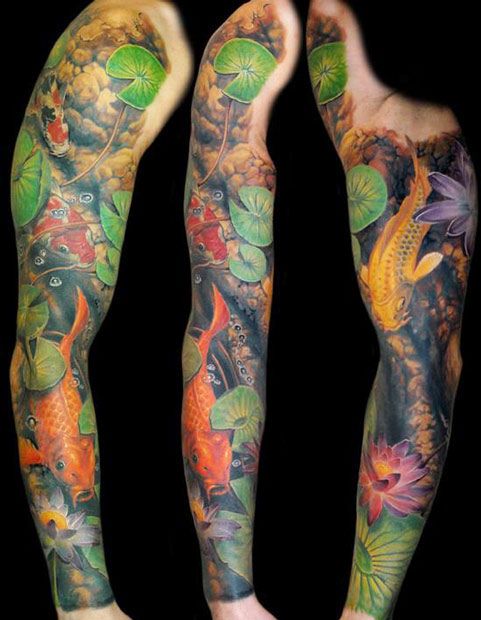 Colourful fish full arm tattoo by James Tattooart