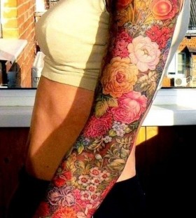 Colourful flowers full arm tattoo