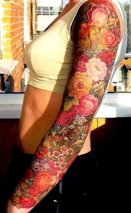 Colourful flowers full arm tattoo