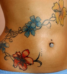 Colourful flowers stomach tattoo