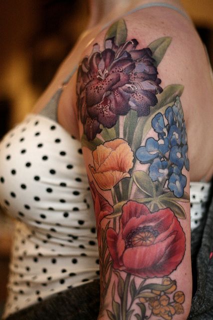 Colourful flowers tattoo by Alice Kendall