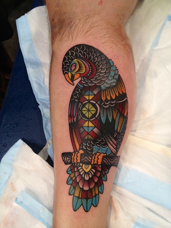 Colourful geometric parrot tattoo