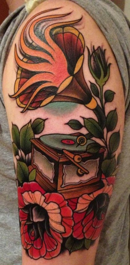 Colourful gramophone and flower tattoo