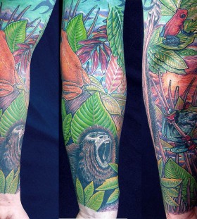 Colourful jungle theme tattoo