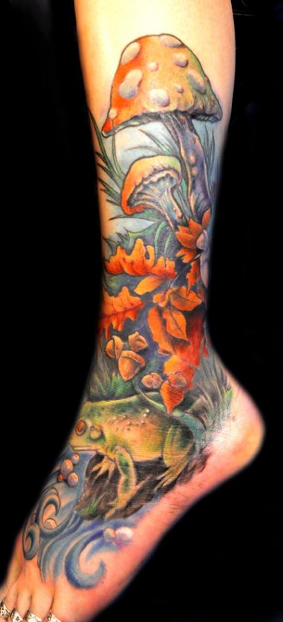 Colourful mushroom and frog leg tattoo