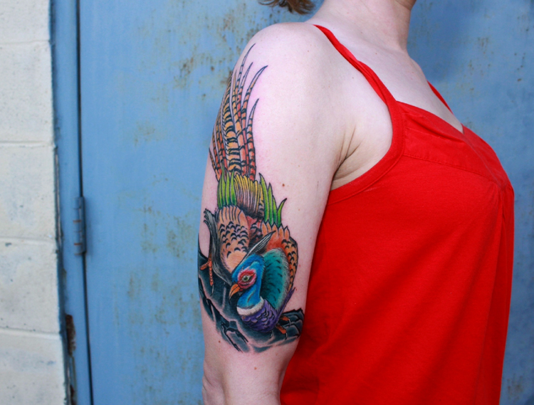 Colourful pheasant arm tattoo