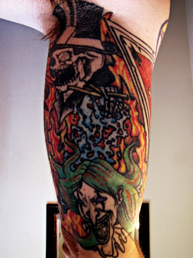 Colourful puppet master tattoo