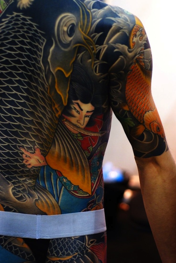 Colourful samurai body tattoo