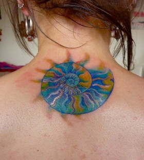 Colourful shell back tattoo