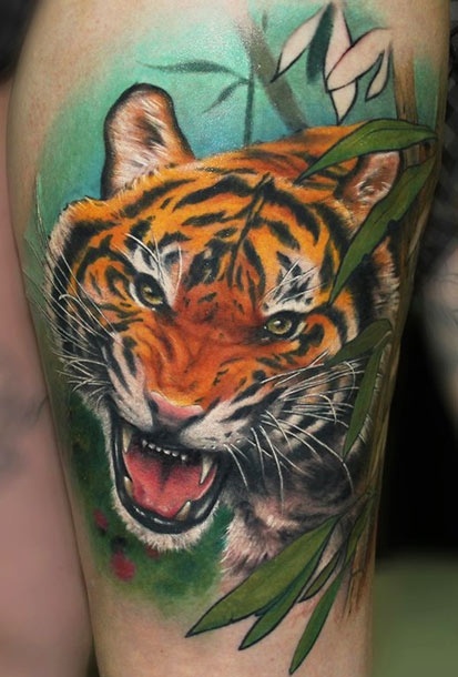 Colourful tiger tattoo by Riccardo Cassese