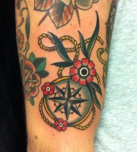 Compass and flowers tattoo
