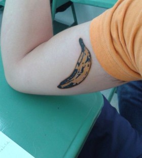 Cool arm bannana tattoo