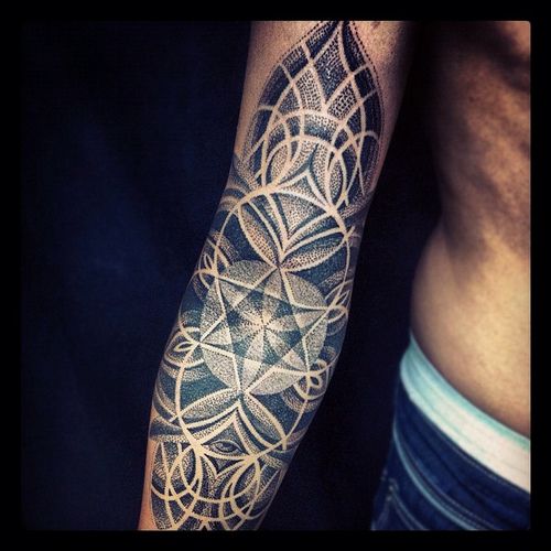 Cool arm tattoo by Brian Gomes