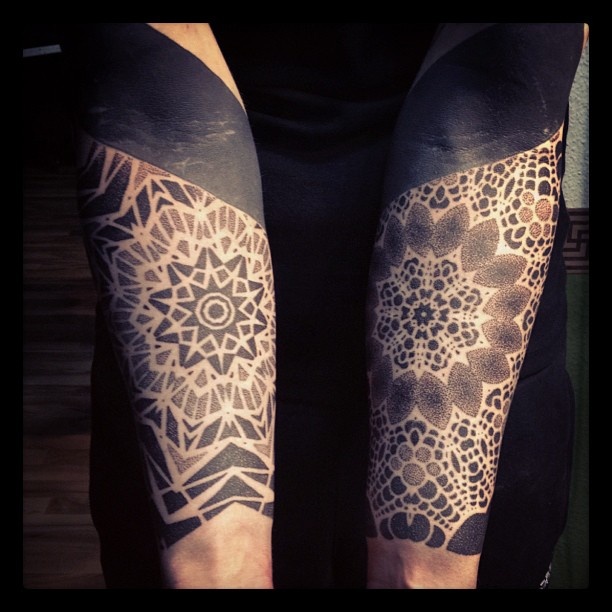 Cool arm tattoos by Gerhard Wiesbeck