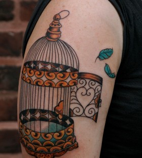 Cool birdcage tattoo design