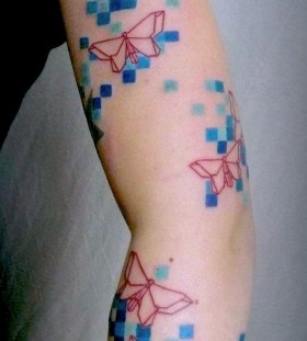 Cool butterflies arm tattoo