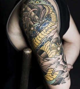 Cool cobra arm tattoo