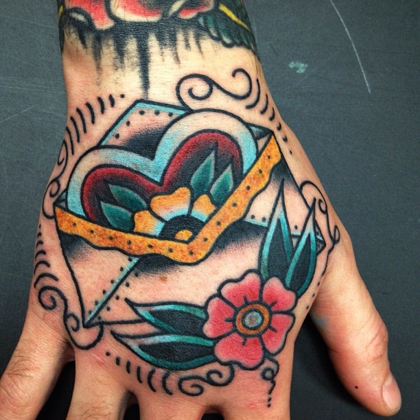 Cool envelope and flower tattoo
