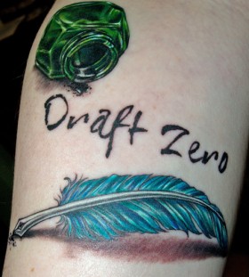 Cool feather pen tattoo