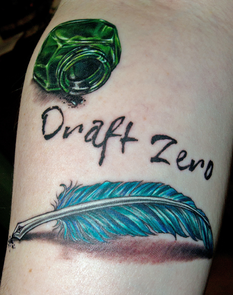 Cool feather pen tattoo