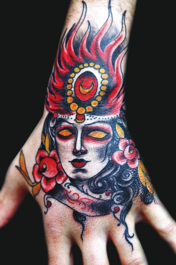 Cool hand tattoo by Eva Huber