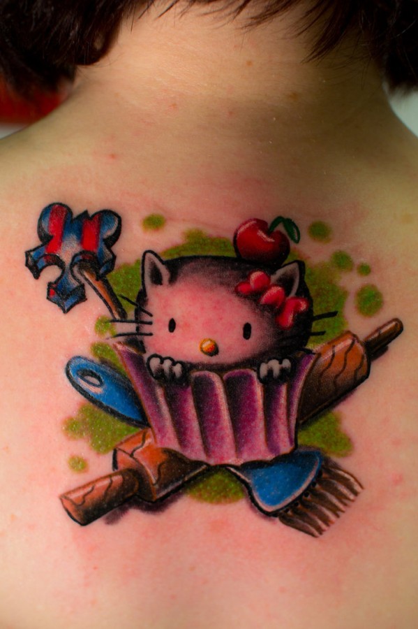 Cool hello kitty back tattoo