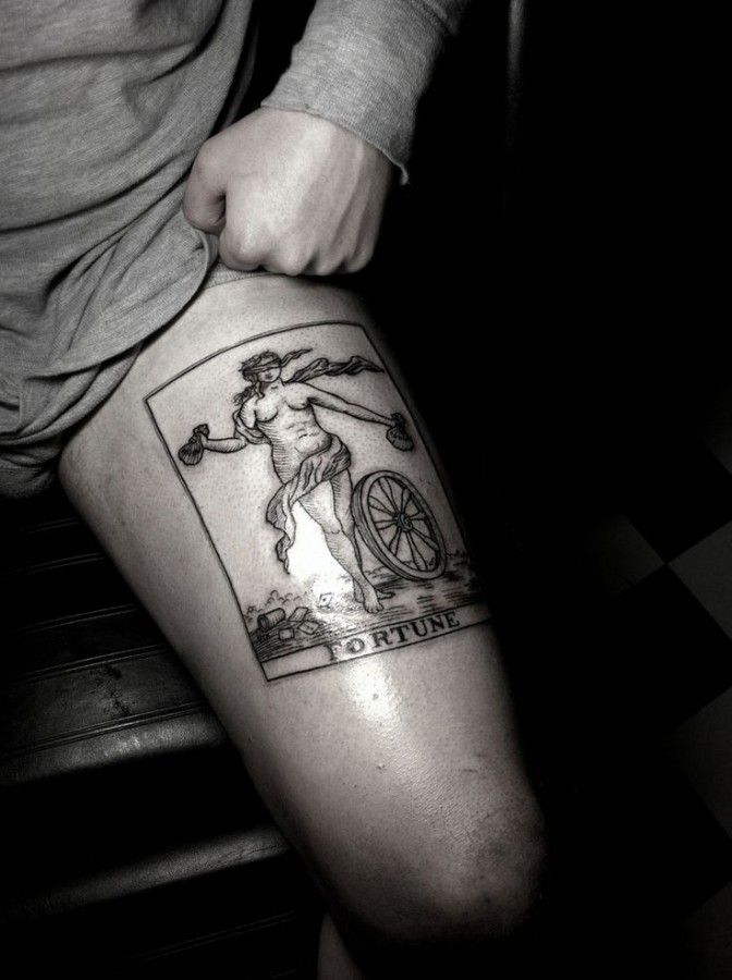 Cool leg tattoo by Thomas Cardiff