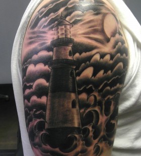 Cool lighthouse arm tattoo