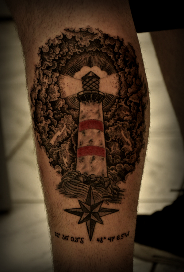 Cool lighthouse leg tattoo