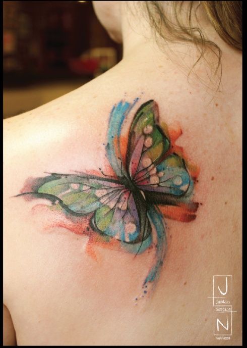 Cool looking watercolor butterfly tattoo