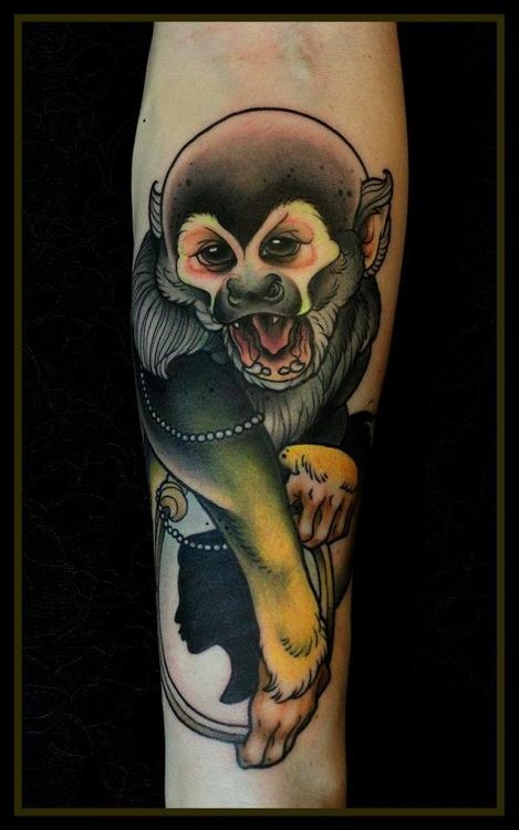 Cool monkey arm tattoo