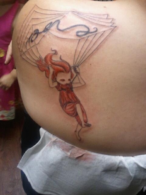 Cool parachuting girl tattoo