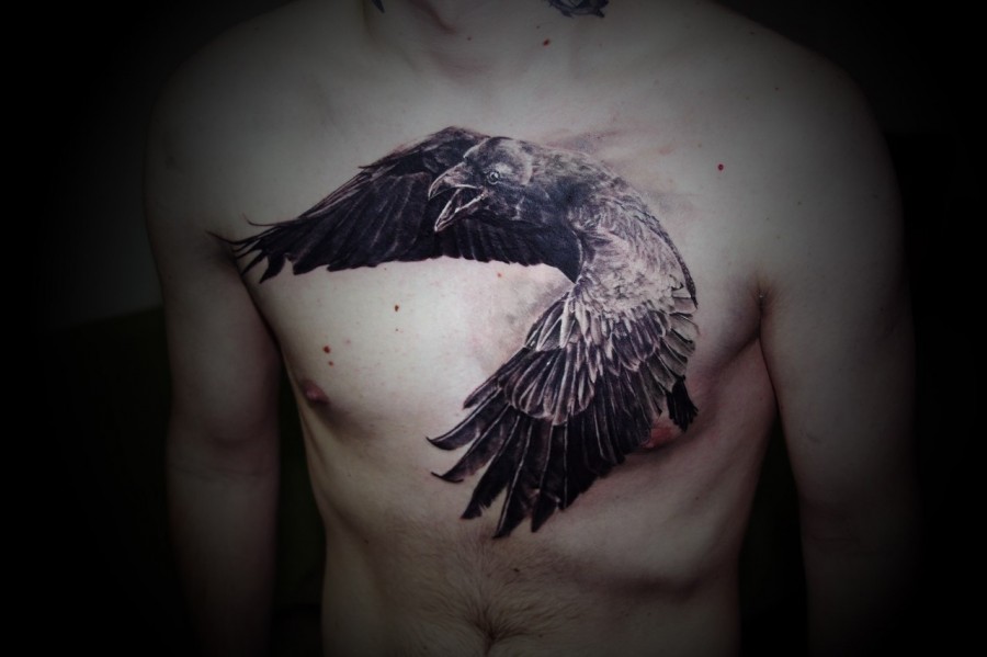 Cool raven chest tattoo