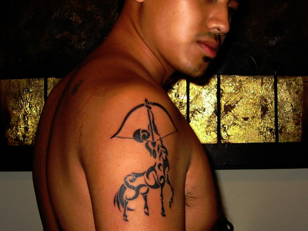 Cool sagittarius arm tattoo