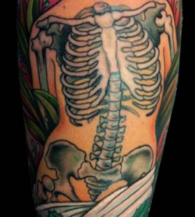 Cool skeleton tattoo by W. T. Norbert