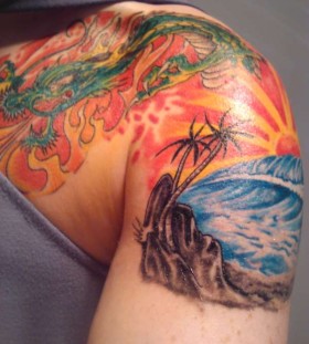 Cool sunset arm tattoo