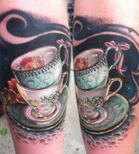 Cool teacups leg tattoo