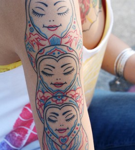 Cool three matryoshkas arm tattoo