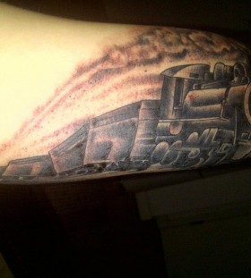 Cool train arm tattoo