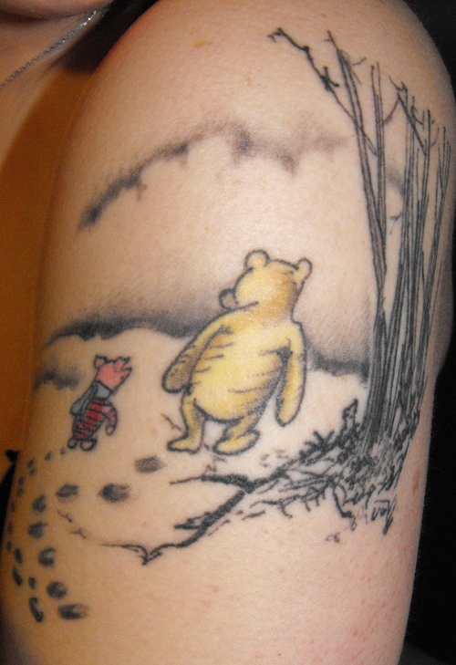 Cool winnie the pooh theme tattoo