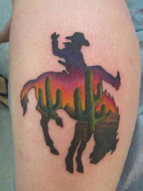 Cowboy on a horse and cactus tattoo