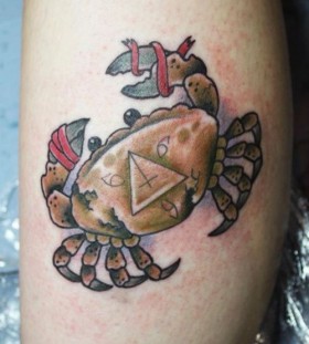 Crab with tied claws tattoo