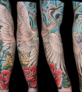 Crane and flowers tattoo