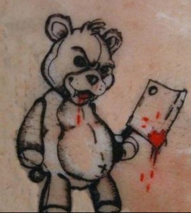 Crazy teddy bear tattoo