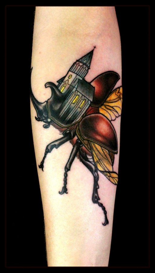 Creative flying bug tattoo
