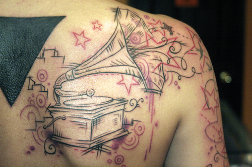 Creative gramophone back tattoo