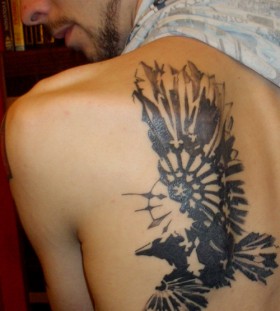 Creative raven back tattoo