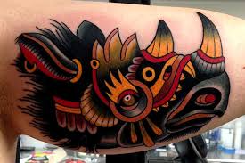 Creative rhino arm tattoo